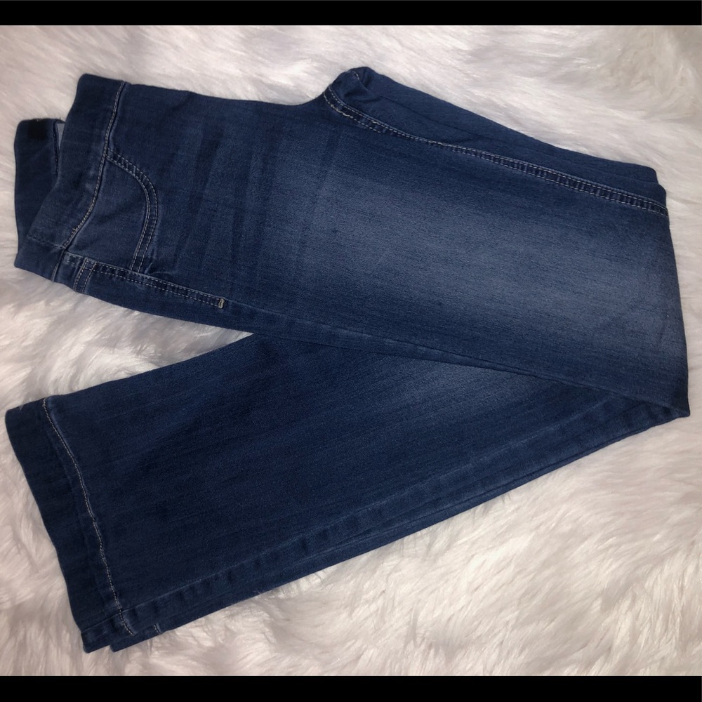 Stretchy bell bottoms. Waist band with no buttons
